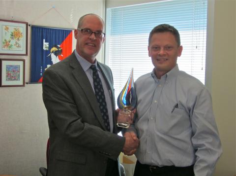 Jeff Sampson, Control Instruments Corporation Executive Client Relations Manager, presenting the first annual Control Instruments Excellence in Safety award to Tim Salaba, Division Engineering Manager for 3M Company Process Information & Control Solutions.